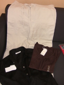 Lara's linen pants size L, black linen shirt and brown pleated singlet top, size M.